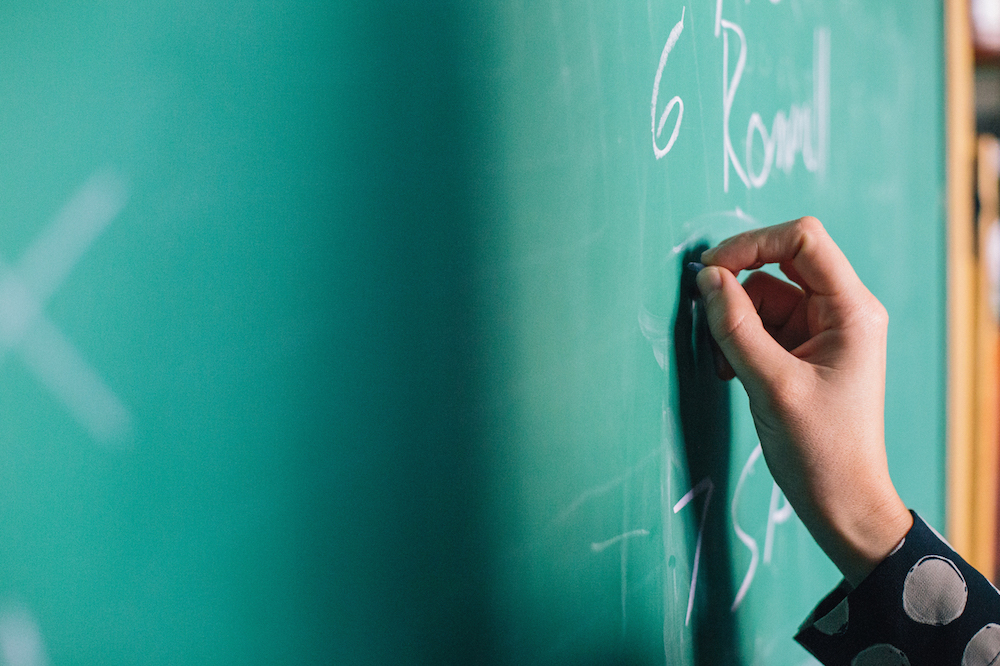 Writing on chalkboard