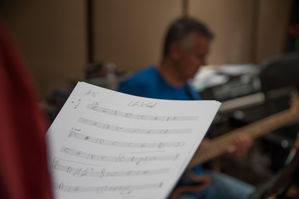 Bass player works on the song "Life is Good."